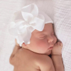 Newborn hat with bow of ribbon white extra warm