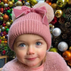 Old pink bow winter hat with pompoms