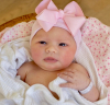Newborn hat with pink bow of ribbon pink striped extra warm