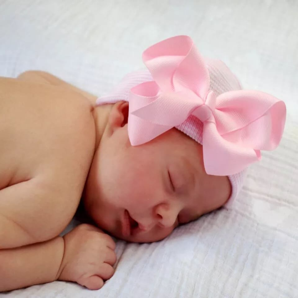 Looking for Newborn hat pink striped with white bow and ...